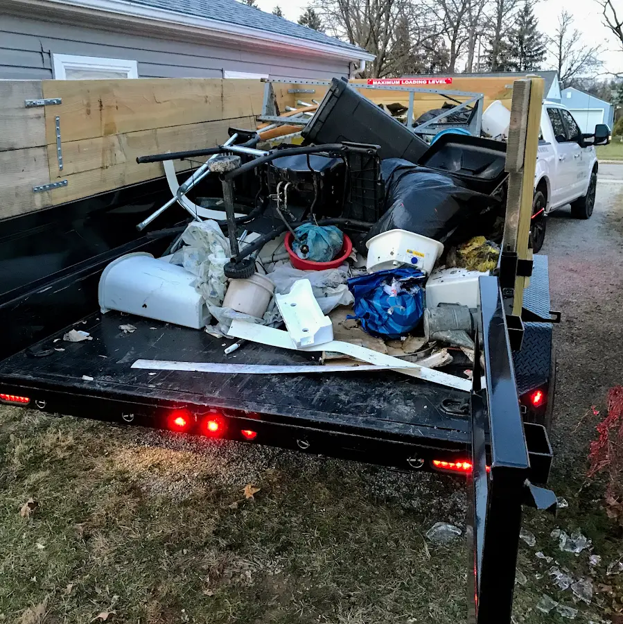 Roll-off dumpster delivered to a residential driveway in Greentown