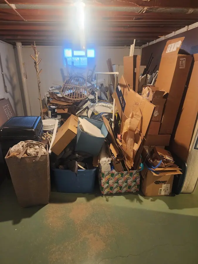 Roll-off dumpster container at job site for Construction Dumpster Rental in Greentown